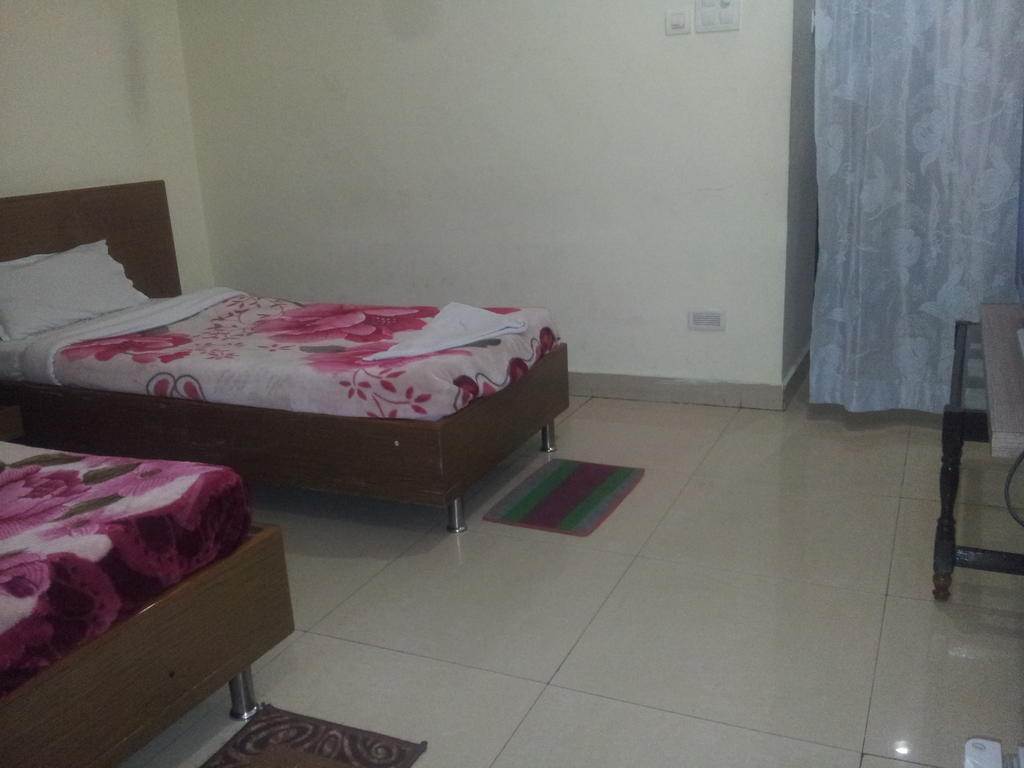 Hotel Fame City Guwahati Habitación foto